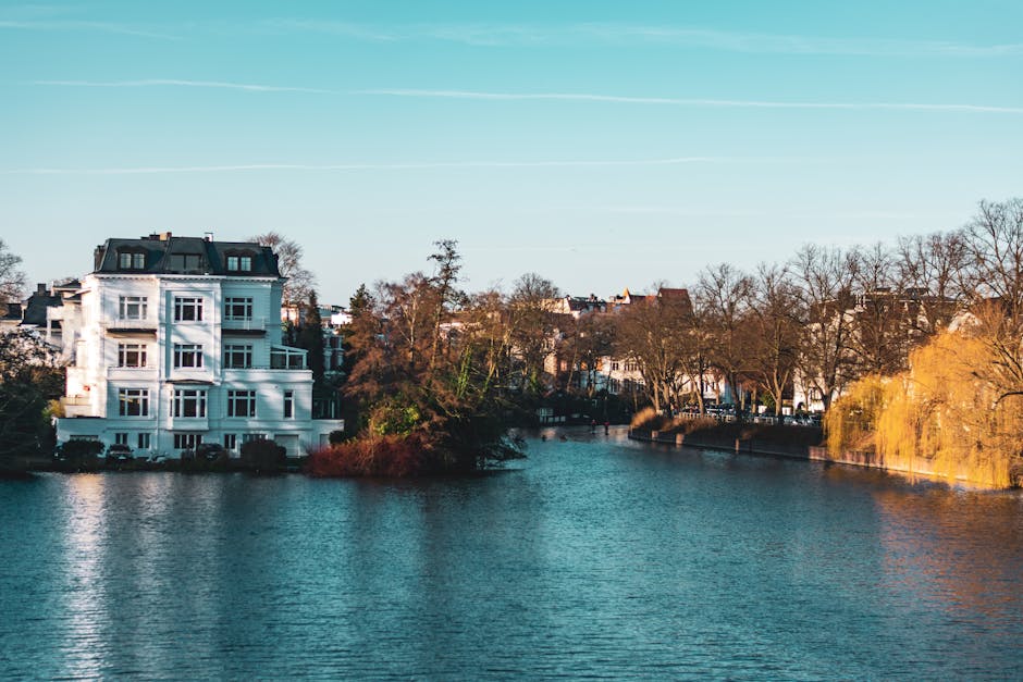 pexels-photo-8291049-8291049 Beautiful view of elegant houses by a canal in Hamburg, Germany on a sunny day.